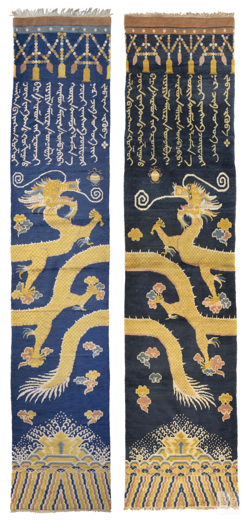 An unusual pair of pillar rugs
